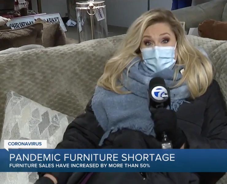 Reporter sitting on sectional